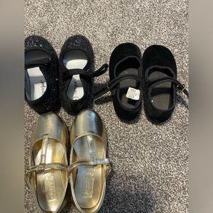 3 pairs of size 7 girls toddler shoes.